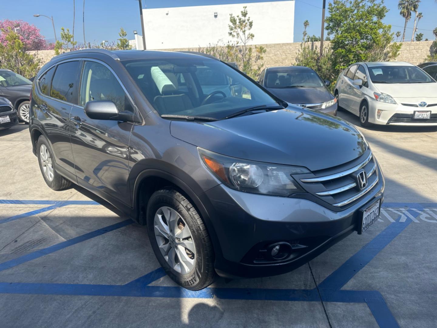 2012 BLUE /GRAY Honda CR-V leather (JHLRM3H70CC) with an 4 CYLINDER engine, Automatic transmission, located at 30 S. Berkeley Avenue, Pasadena, CA, 91107, (626) 248-7567, 34.145447, -118.109398 - Cars and Trucks!! Leather! Moon-roof! Well equipped! In the bustling streets of Pasadena, CA, and the vibrant neighborhoods of Altadena, Glendale, and the broader LA County, finding a reliable, stylish, and affordable vehicle can be a daunting task, especially if you're navigating the complexities - Photo#7